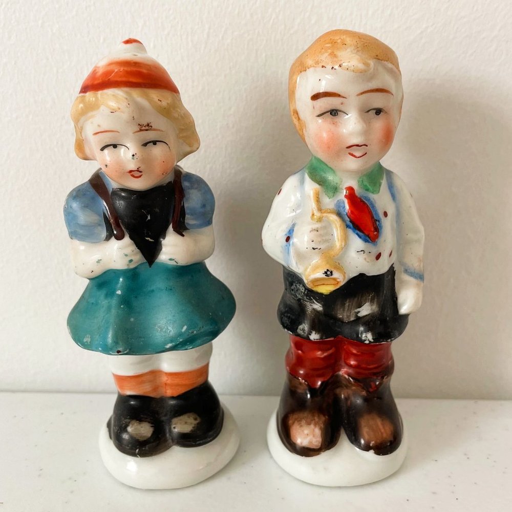Vintage Porcelain Girl w/ Backpack Boy w/ Trumpet Figurines Made Occupied Japan